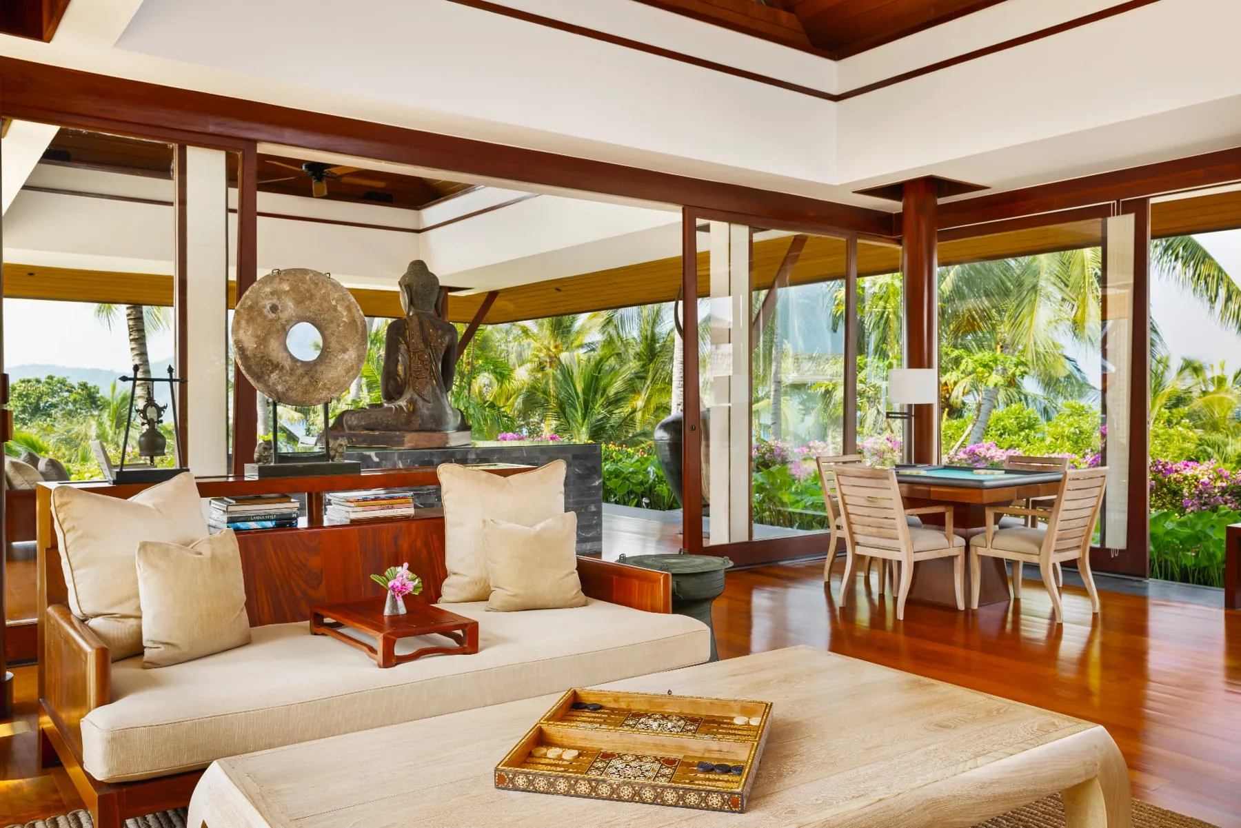 Library sala living room with Buddha sculpture, backgammon and mahjong table