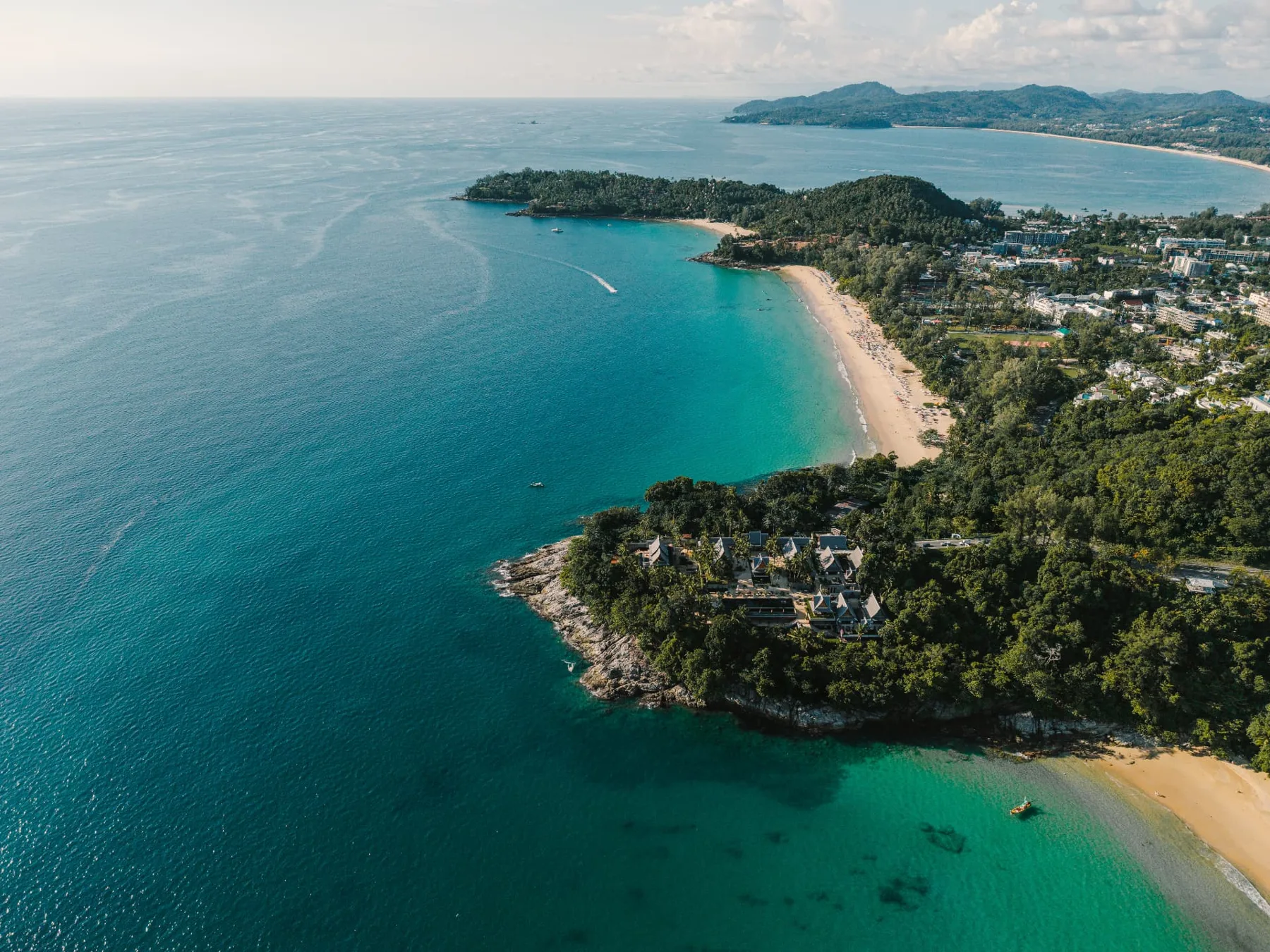 Coastline view of the private headland between Surin and Laemsingh Beach