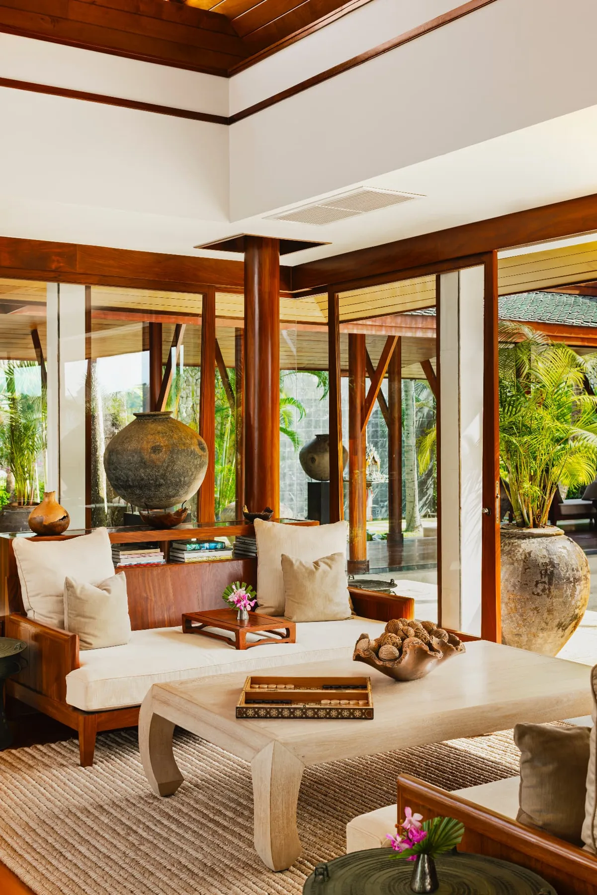 Library sala with open-air seating and Thai antiques